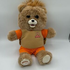 Teddy Ruxpin animated singing plush, not the one with cassette player